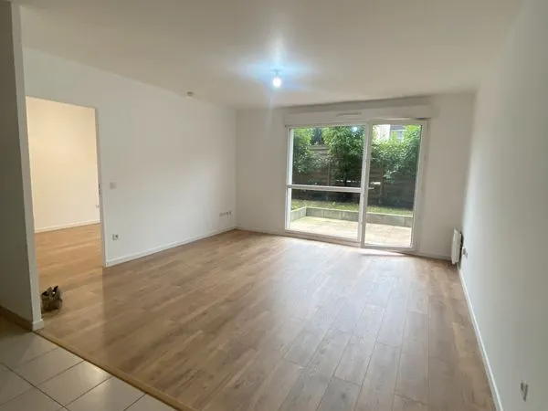 Appartement F2 de 40 m² + jardin + parking 