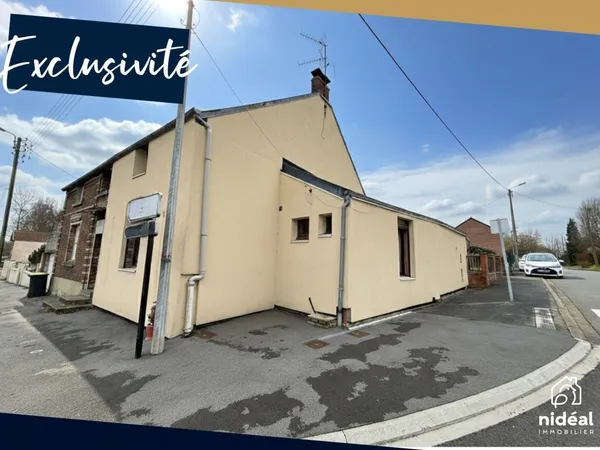 Maison semi mitoyenne avec garage et terrain 