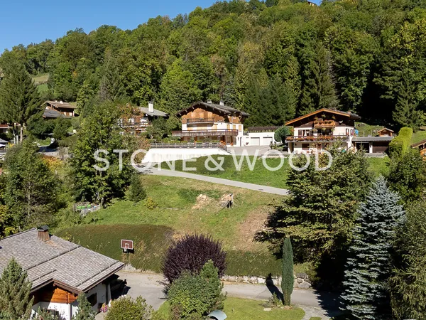 Rare à la vente - terrain avec chalet individuel 
