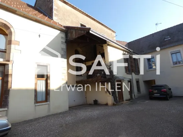Appartement , 115 m²,5 pièces,4 chambres,salon cuisine,garage, dépendances et jardin. 