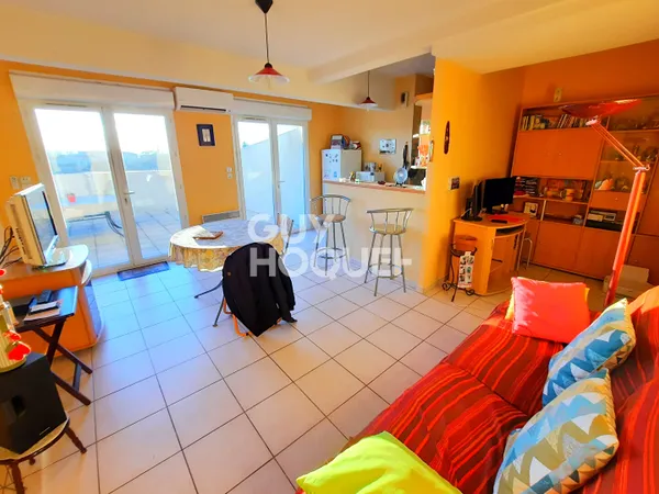 APPARTEMENT DE TYPE 3 AVEC ASCENSEUR TERRASSE ET GARAGE 