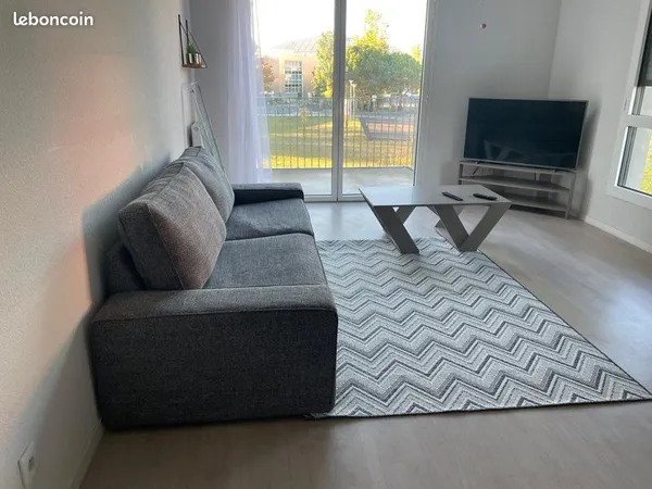 T2 meublé 50 m² avec balcon sans vis-à-vis, parking & résidence sécurisée - À 100 m du tram 