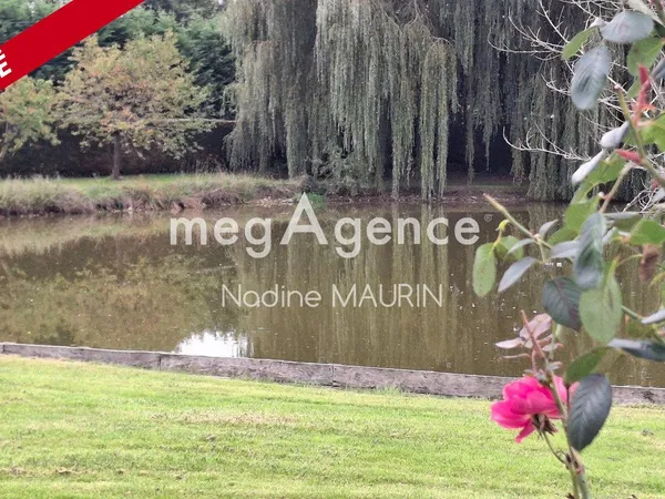 Propriété d' exception en Sologne avec étang et piscine 