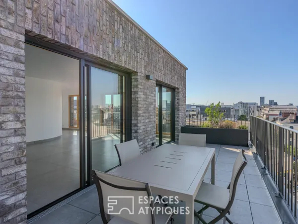 Superbe appartement de 127m2 en roof top avec terrasse 