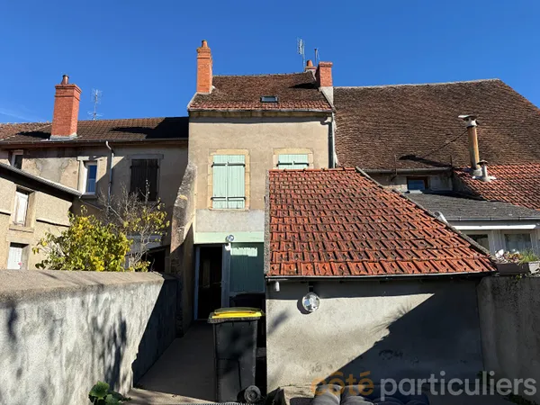 Maison de ville avec jardin proche centre-ville et commodités 
