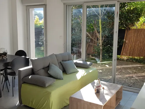 Joli T2 de 41 m2 avec une grande parcelle et une place de pa 