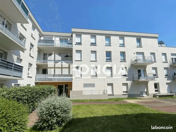 Appartement T3 avec balcon et place de stationnement 