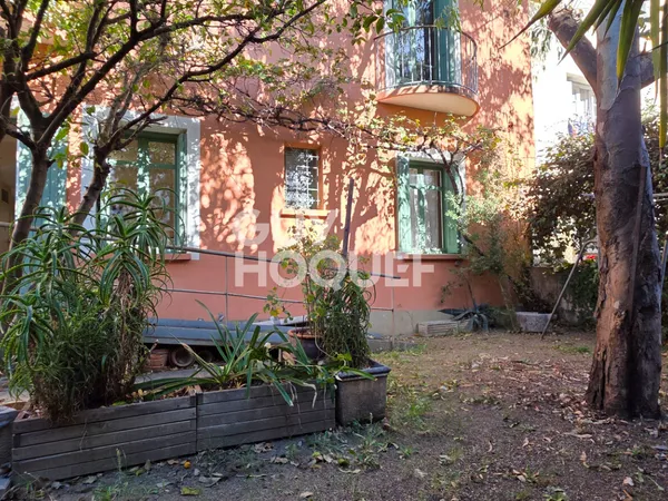 Maison de ville familiale 2 faces avec jardin arboré et garage 142 m² à Perpignan 