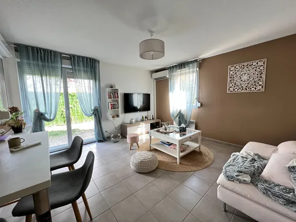 A LOUER - FROUZINS - Appartement T3 en rez de jardin de 63 m² avec parking - G1047 