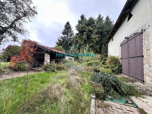 Maison de 100m² avec jardin de 1 800m² et dépendances 