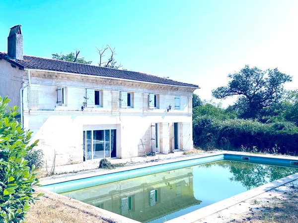 A VENDRE MAISON EN PIERRE AVEC TERRAIN ET ETANG - SECTEUR COUTRAS 