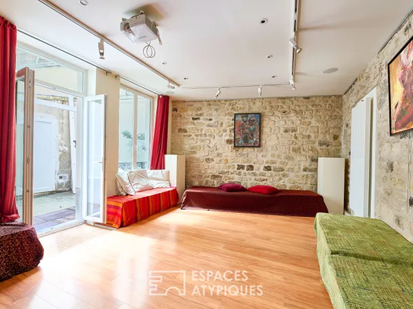 Appartement-atelier avec cour privative à Jules Joffrin 