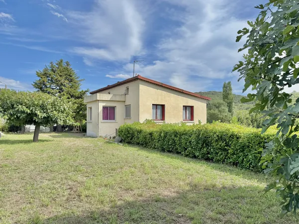 Maison individuelle avec terrain attenant 