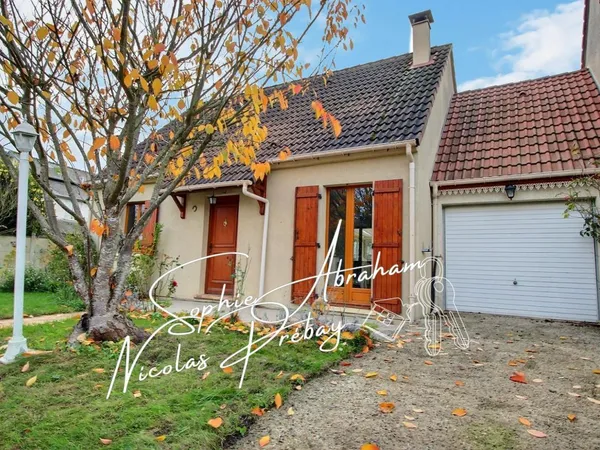 Maison individuelle avec garage et jardin clos 