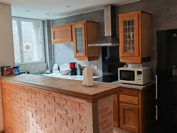 Grand appartement T4 jardinet/garage Uzel 