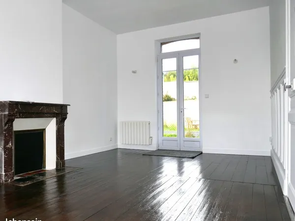Appartement F3 58 M2 duplex en rez de jardin + 1 stationnement 