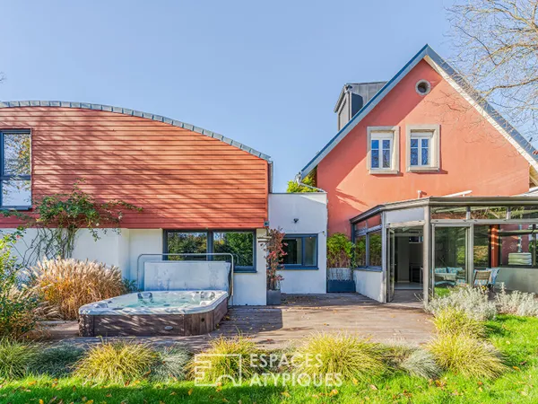 Maison années 30 et son extension contemporaine avec jardin paysagé 