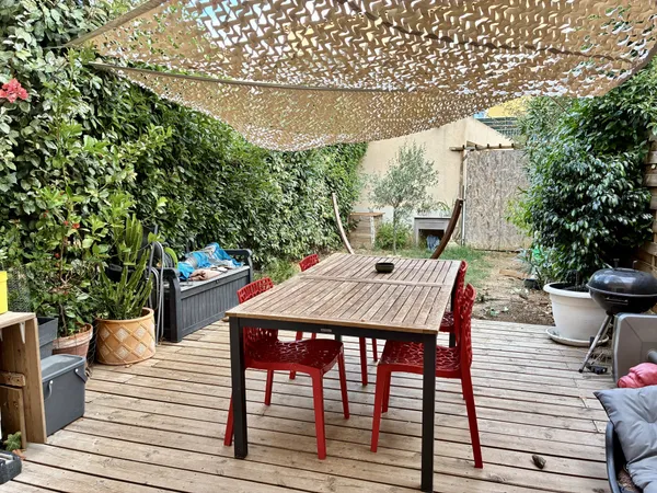 Maison de type 3 avec terrasse et garage 