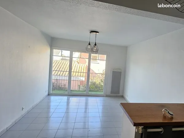 Appartement T3 58 m² sans vis-à-vis - Balcon - 2 parkings couverts 