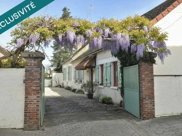 Maison de caractère avec dépendances et piscine à Gurgy 