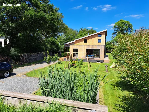 Maison ossature bois bioclimatique 165m² avec dépendance 34m² et jardin 1300m² 
