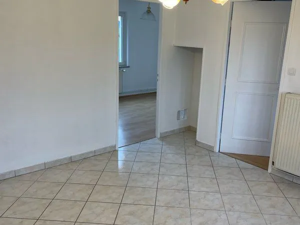 Appartement F4 - 66 m² - Balcon, garage et parking 