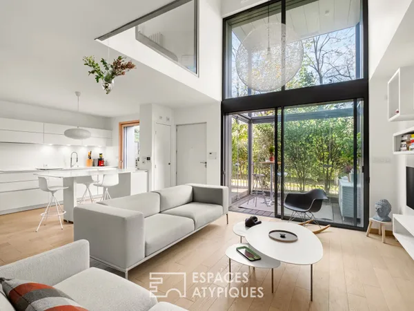 Duplex en rez-de-jardin dans une copropriété exclusive 
