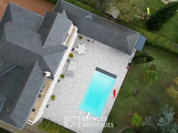 Villa contemporaine avec piscine & spa : l'élégance d'une vie dedans-dehors, au coeur de Pruniers 