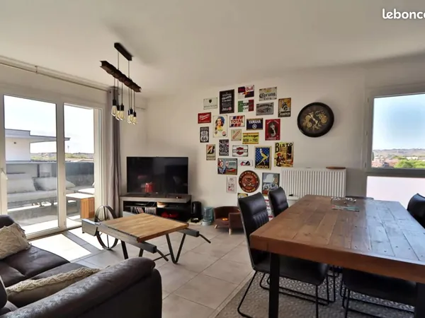 Appartement T3 avec balcon et double parking 