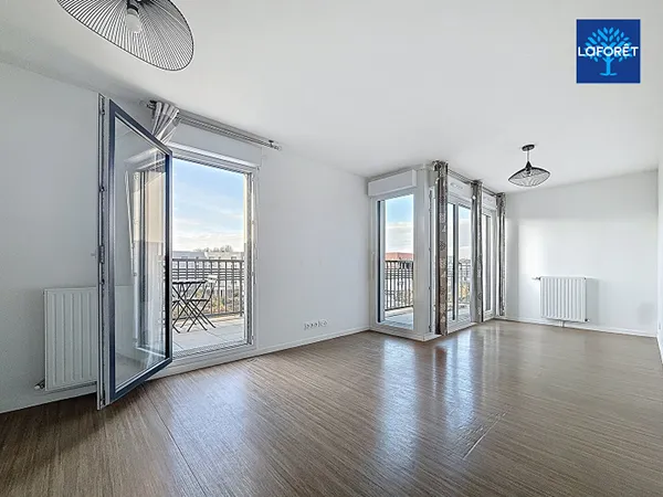 Appartement 3 pièce(s) 60.58 m2 - RER A - Parking - Double balcon 