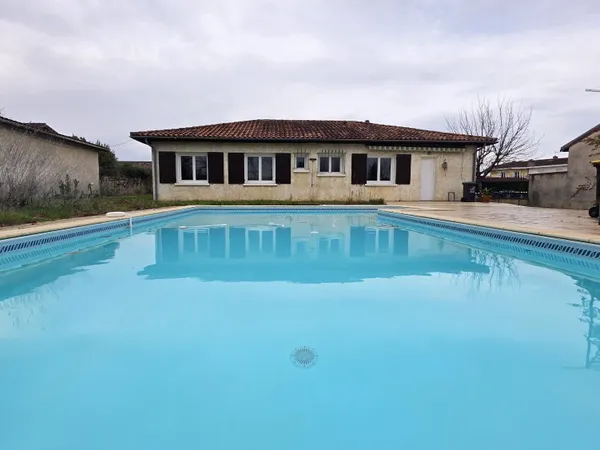 Plain-pied avec piscine au centre ville 