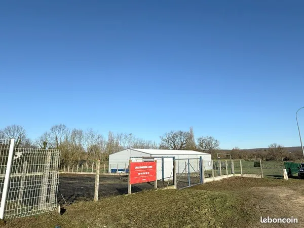 Terrain 1000m2 + bureau zone commerciale 