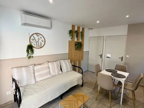 T2 meublé climatisé avec jardin et terrasse 
