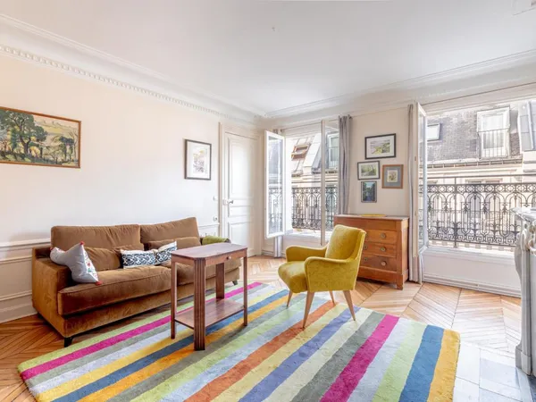 Paris 9ème - Duplex traversant lumineux avec balcon 