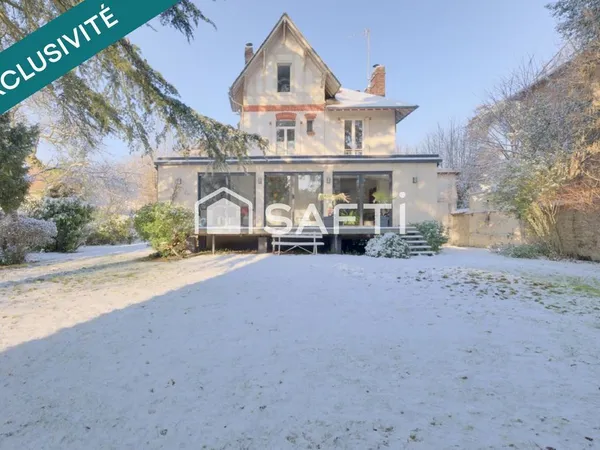 Maison d'exception avec magnifique jardin arboré au sein du quartier du Parc 