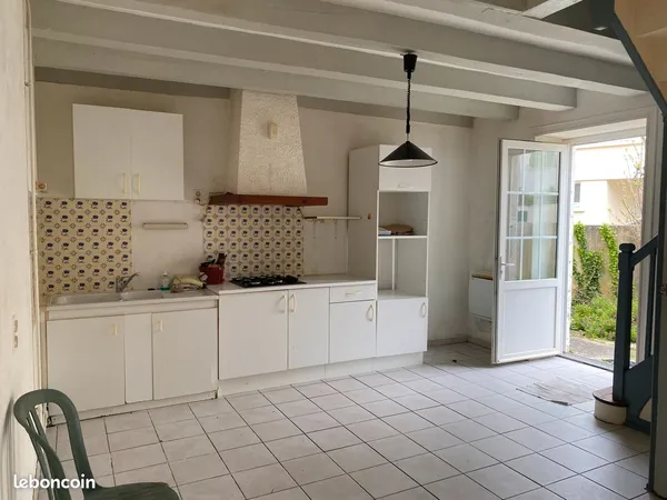 Maison avec courette et garage 