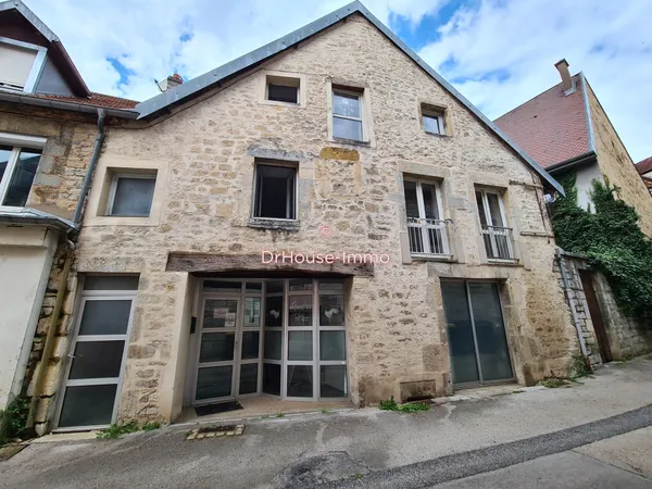 Immeuble de rapport - 2 appartements - un local commercial 