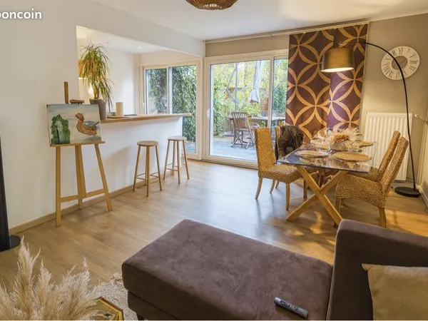 Rez-de-jardin 87 m² avec terrasse - 3 chambres - Proche gare 