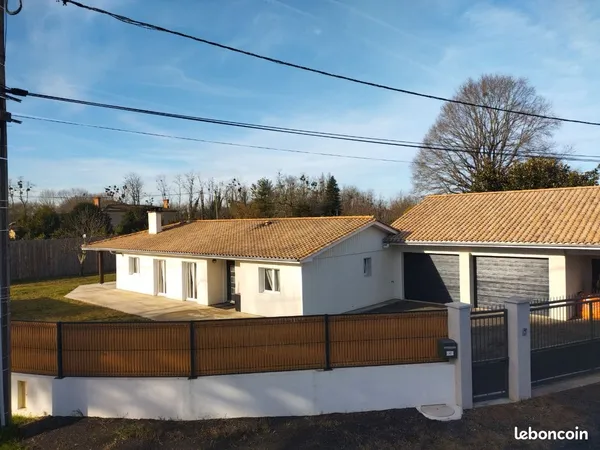 Grande maison avec triple garage 
