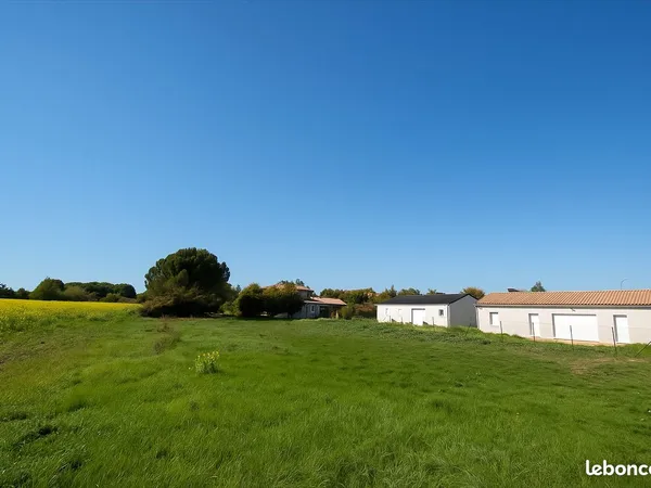 Terrain neuville poitou viabilise proche centre 