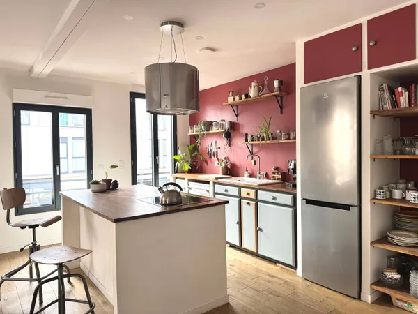 Duplex mien aménagé avec prestations de qualité 