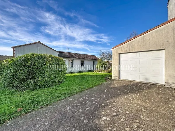 plain pied avec garage, bel emplacement 