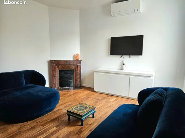 Duplex refait à neuf avec jardin 