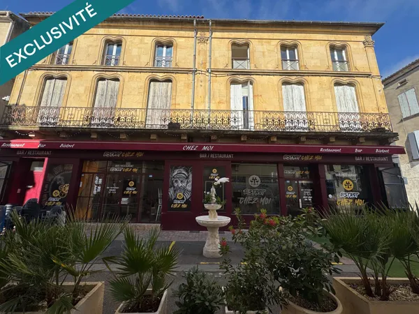 Immeuble de rapport : 6 appartements + local loué 