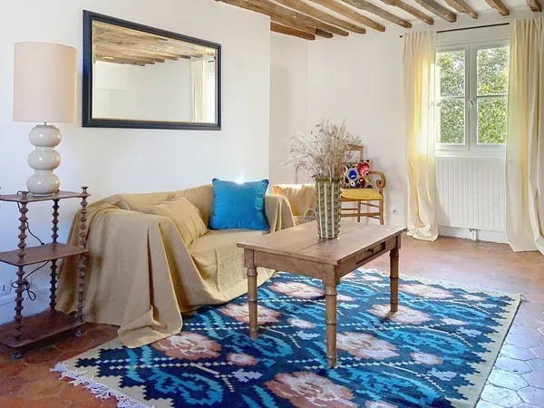 Duplex de charme en dernier étage au coeur de Rive droite 