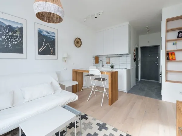 Studio en Rez-De-Jardin à Segny 