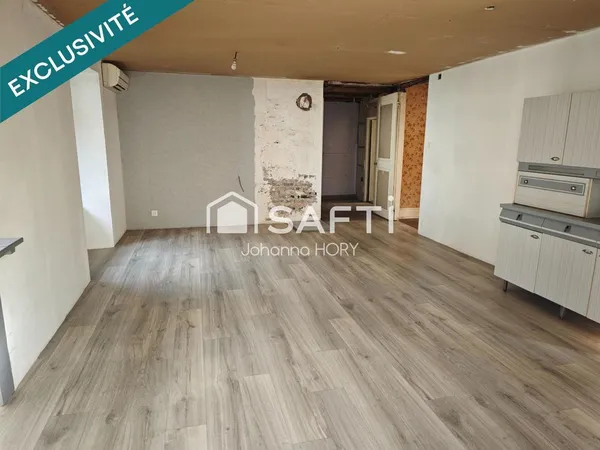 Appartement rez-de-jardin 72 m2 avec garage, cave et grenier 