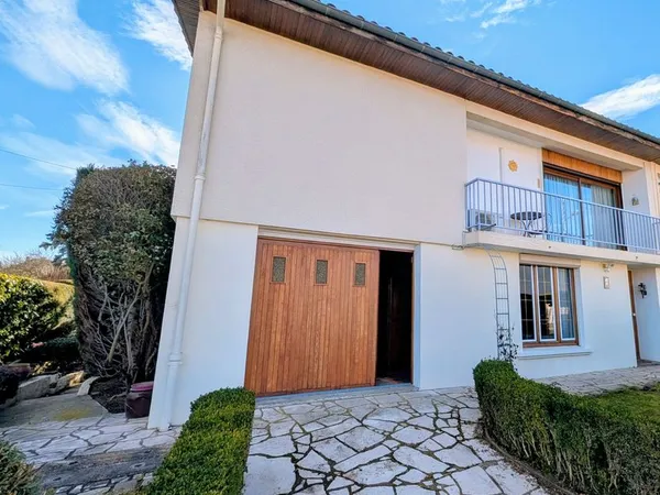 Maison spacieuse avec garage et jardin clos - Secteur idéal au calme 