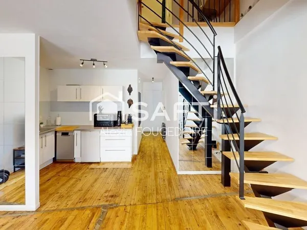 APPARTEMENT ATYPIQUE POUTRE ET PIERRE APPARENTE TYPE 2 