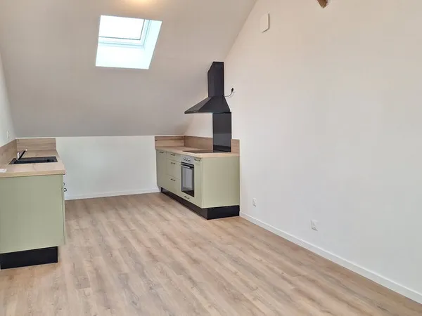 Appartement proche commerces 